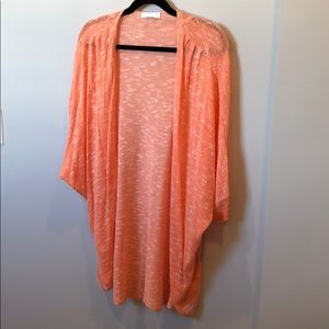 SayWhat? Drapey cardigan in peachy -orange/white